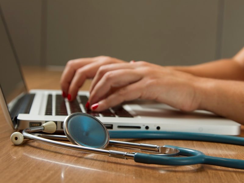 Naturopathic doctor reviewing comprehensive lab results — an essential step in our test-don't-guess approach